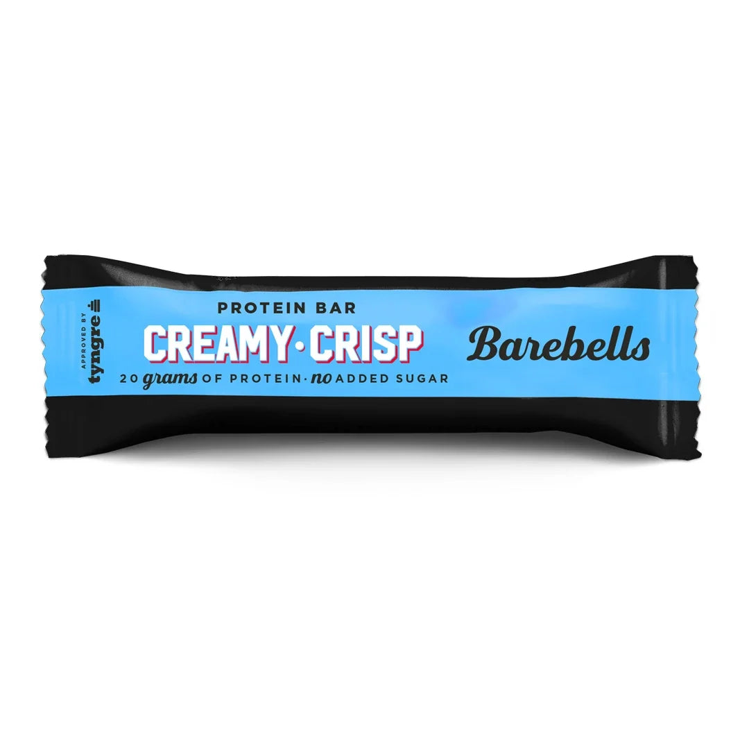 Barebells Soft protein bar 55 g Creamy Crisp i en svart och ljusblå förpackning., bild 3 av 21