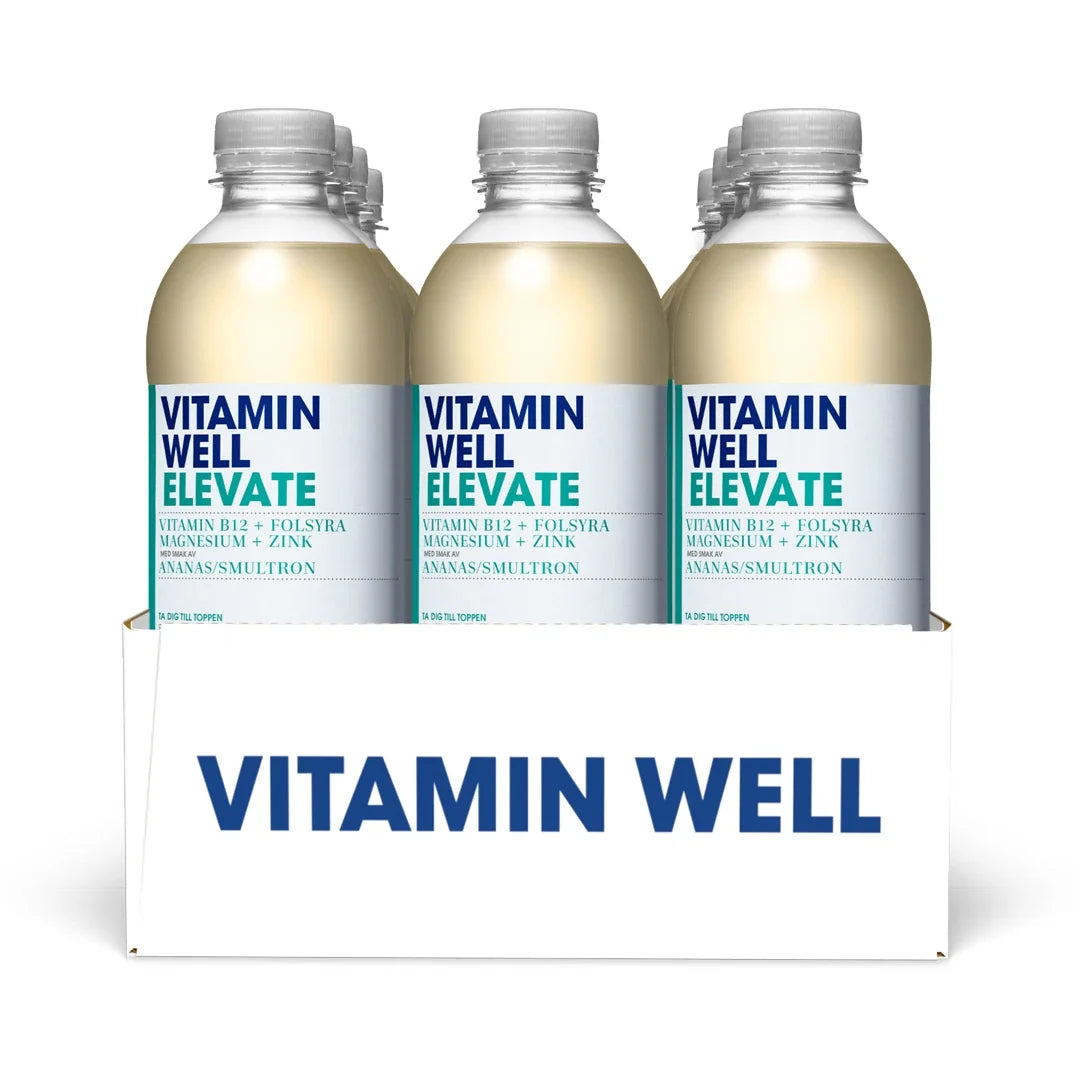 12 x Vitamin Well 500 ml Elevate Ananas Smultron i en vit kartong med transparenta flaskor och vita etiketter.