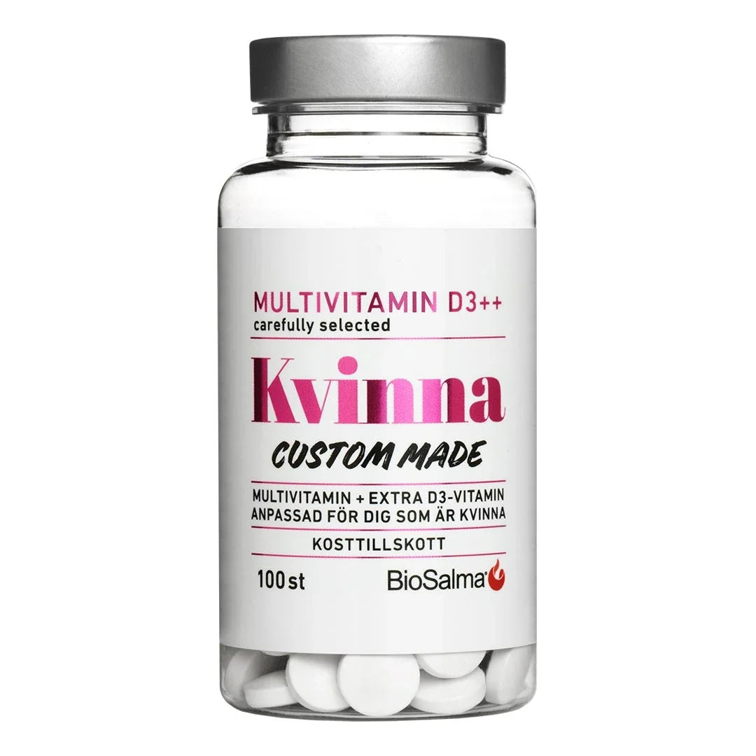 BioSalma Multivitamin Kvinna D3++ 100 tabs i en genomskinlig burk med vit etikett, rosa detaljer och silverlock.