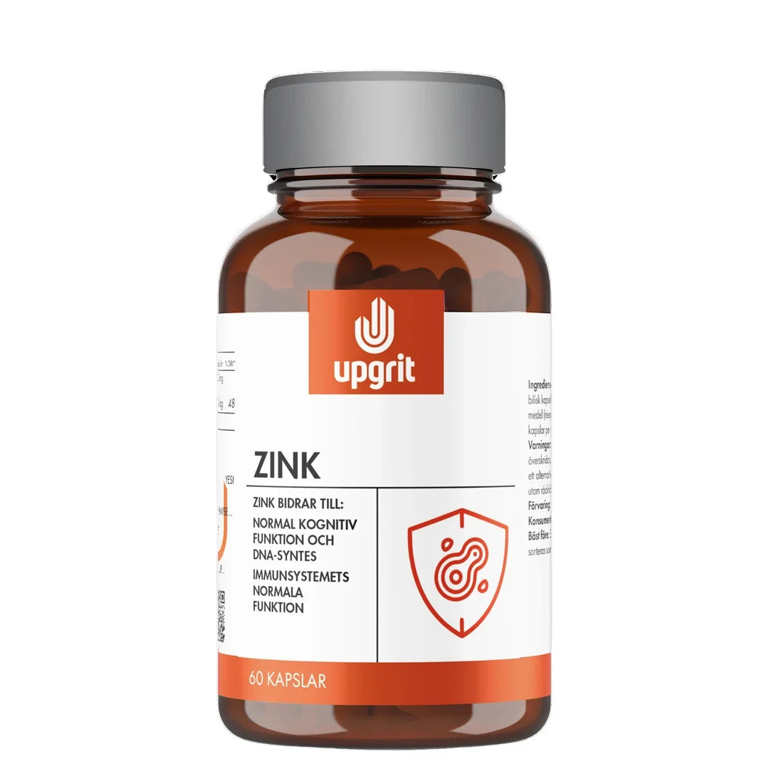 Upgrit Zink 60 caps kosttillskott i en mörkbrun burk med grått lock, vit etikett och orange logotyp.
