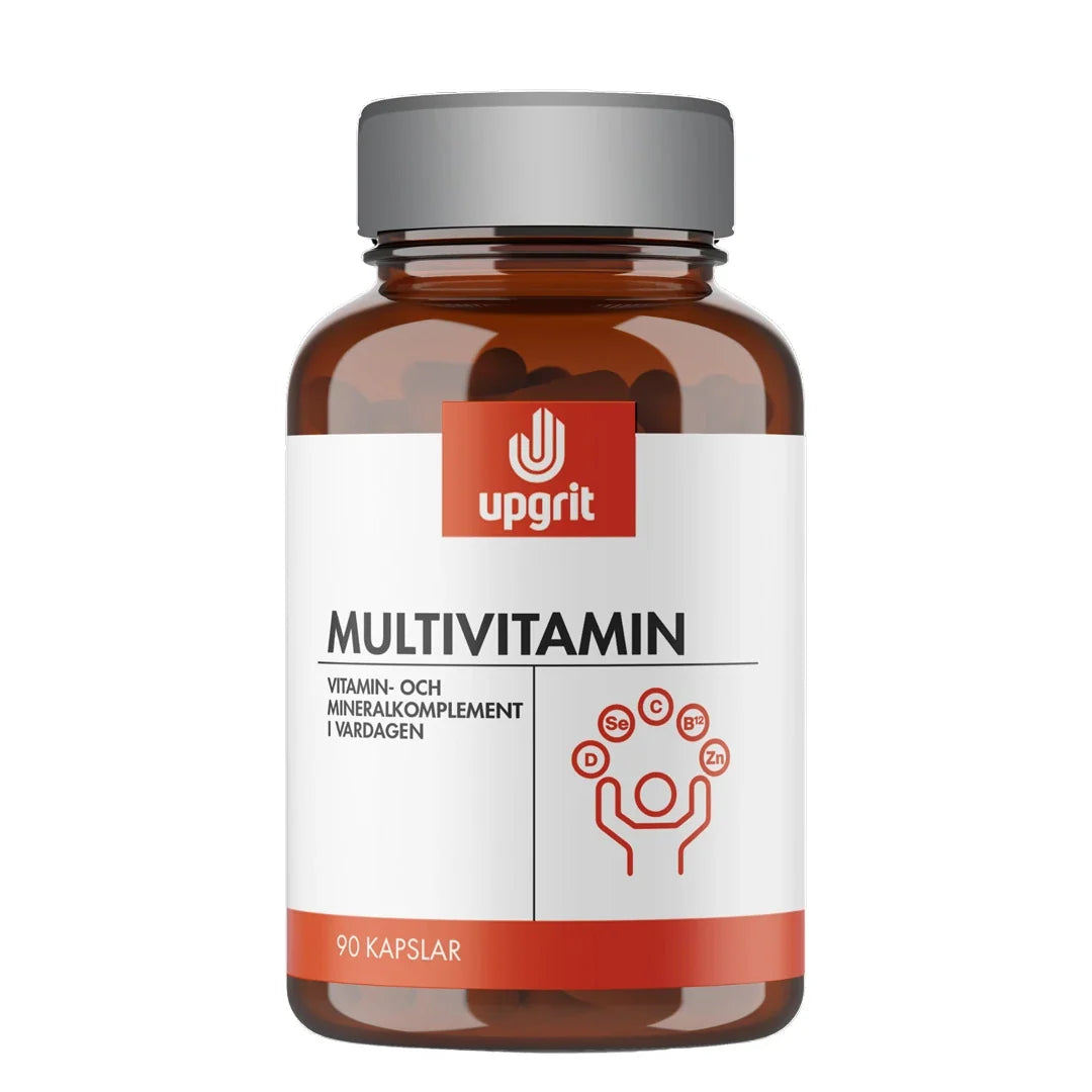 Upgrit Multivitamin 90 caps förpackad i en mörkbrun burk med grått lock och vit etikett med röda detaljer.