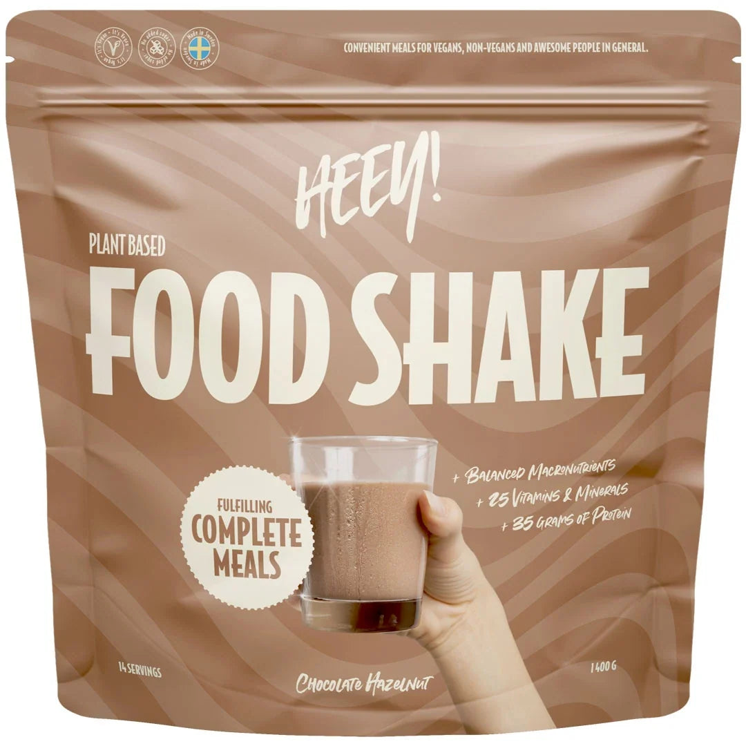 Heey! Food Shake 1.4 kg vegansk måltidsersättning i en brun påse för smaken Chocolate Hazelnut.