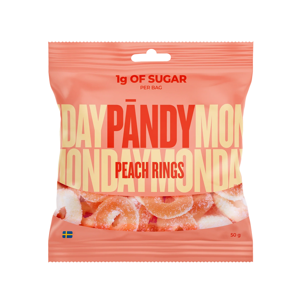 Pändy Candy Peach Rings 50 g i en persikofärgad påse fylld med mjuka gelé- och skumringar.