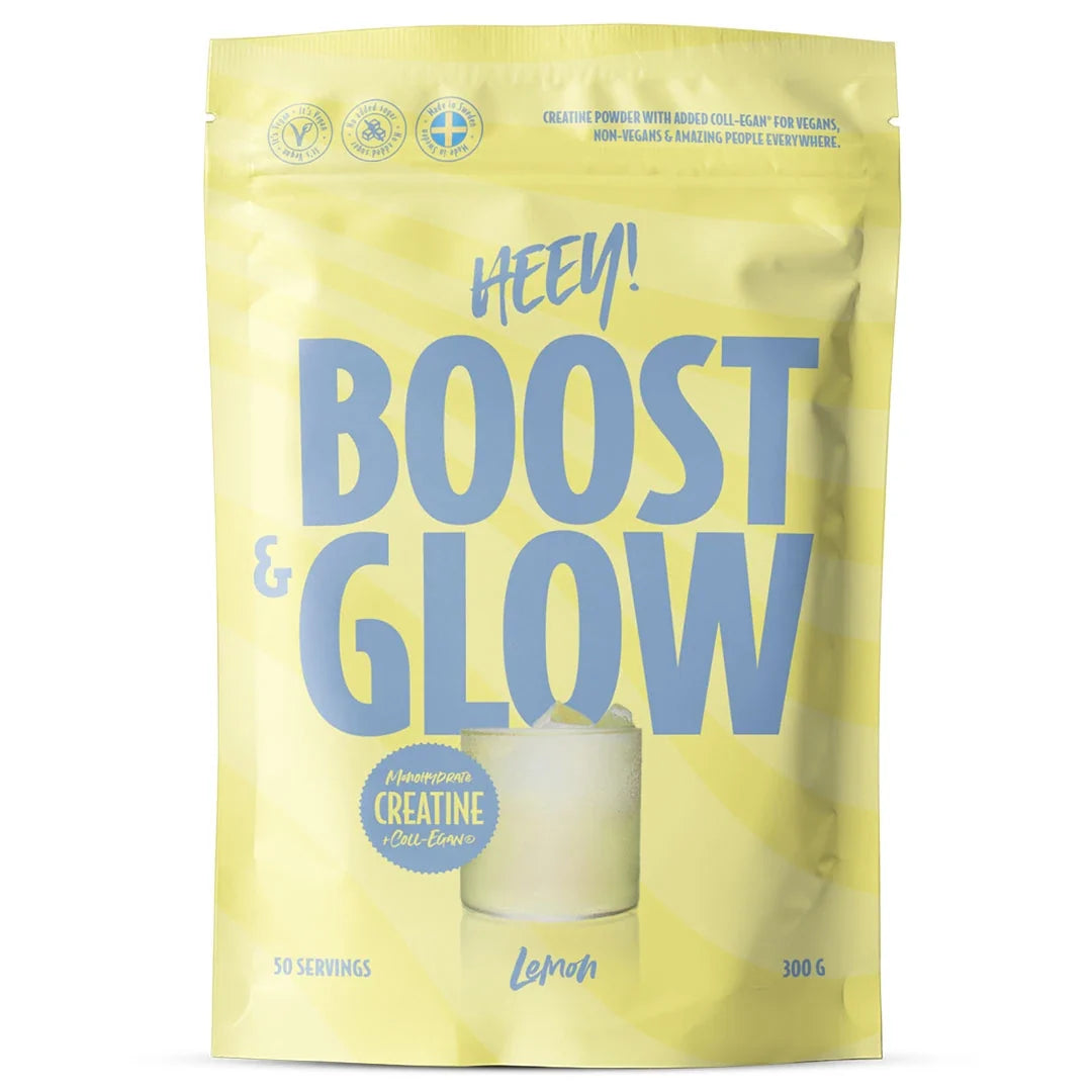 Heey! Boost &amp; Glow Creatine + Coll-egan® 300 g veganskt kreatinpulver i en gul påse med blå text för smaken Lemon., bild 1 av 3