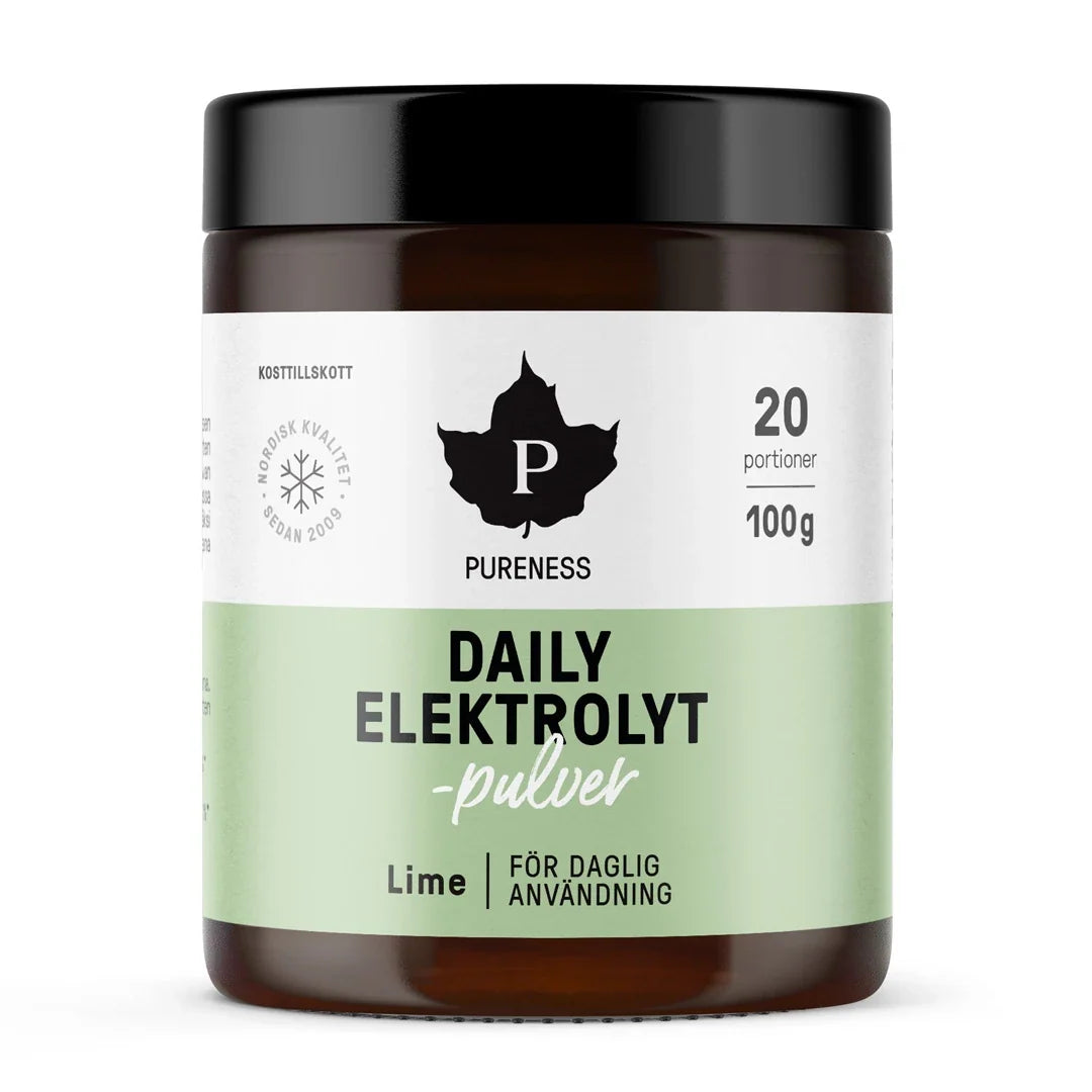 Pureness Daily Elektrolytpulver 100 g i en mörkbrun burk med svart lock och en vit och grön etikett för smaken Lime.