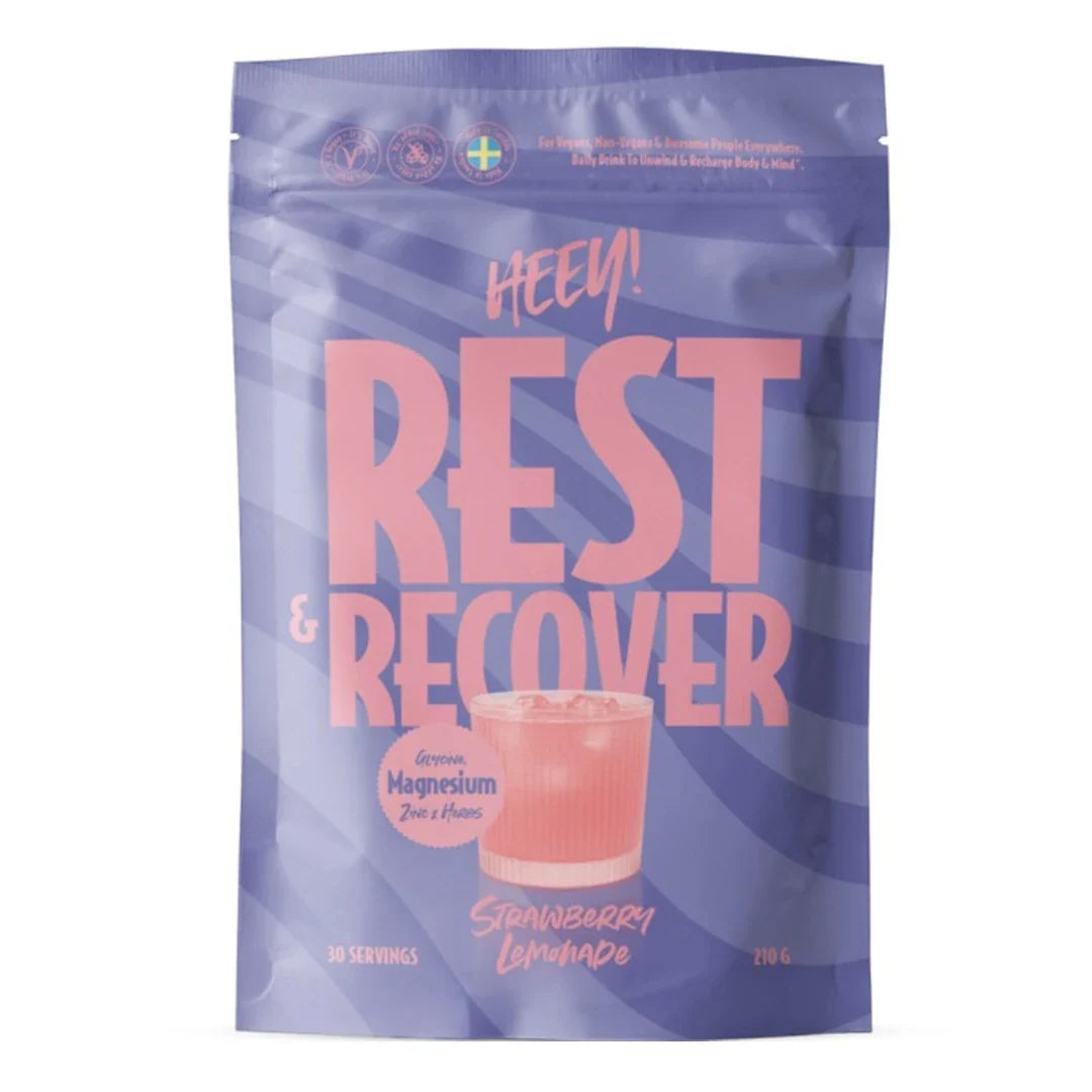 Heey! Rest &amp; Recover Magnesium 210 g pulver i en lila påse med rosa detaljer och smaken Strawberry Lemonade., bild 1 av 1