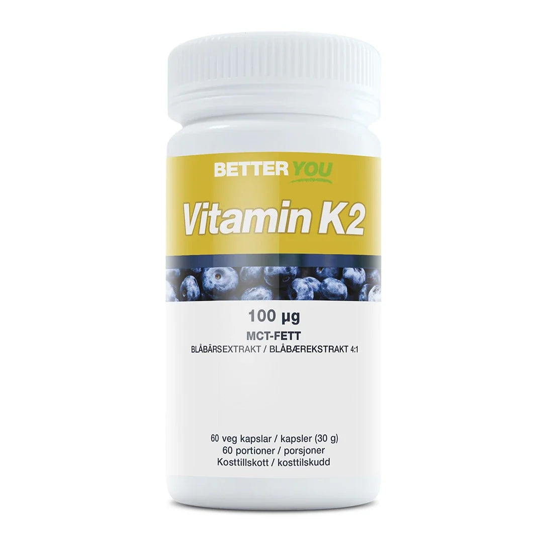 Better You Vitamin K2 100 µg - 90 kaps, ett kosttillskott i en vit burk med gul etikett och blåbärsmotiv., bild 1 av 1
