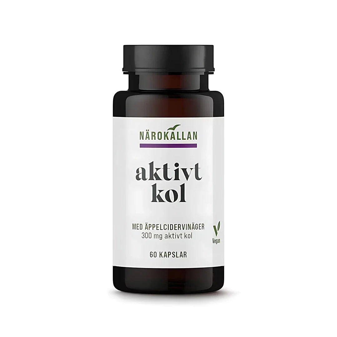 Närokällan Aktivt kol + Äppelcidervinäger 60 caps i en mörk burk med vit etikett., bild 1 av 1