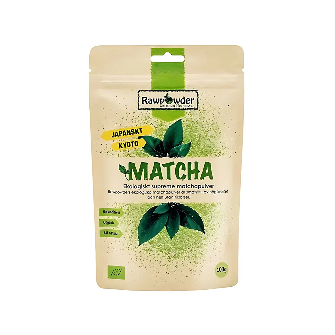 Rawpowder Matcha 100 g ekologiskt matchapulver i en ljusbeige påse med gröna blad och detaljer., bild 1 av 1