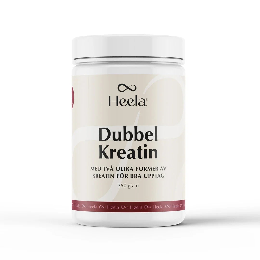 Heela Dubbel Kreatin 350 g kreatin i pulverform, förpackad i en vit burk med ljusbeige etikett.