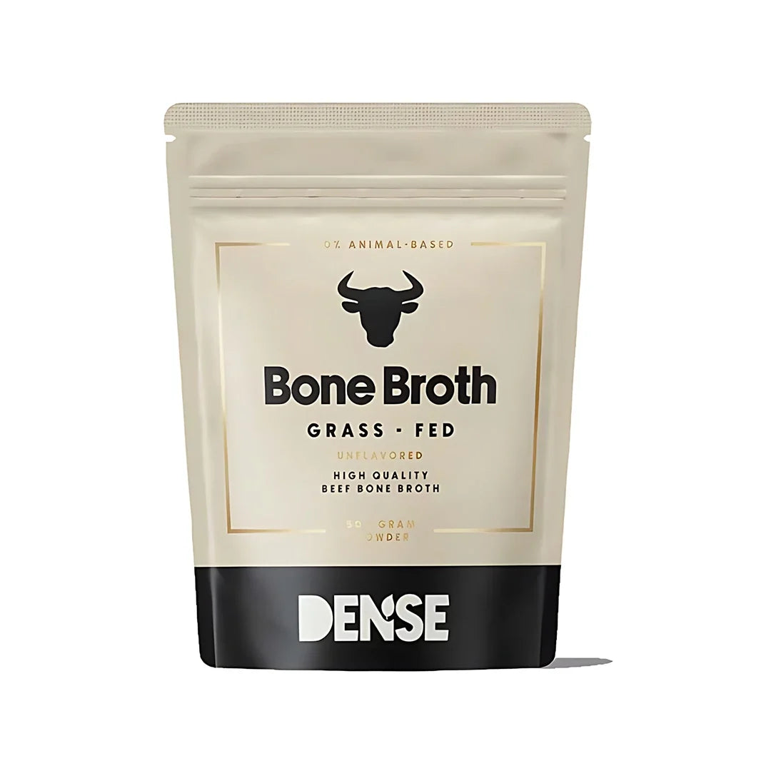 Dense Bone Broth 500 g benbuljongpulver från gräsbetande djur i en beige påse med svarta och guldiga detaljer., bild 1 av 1