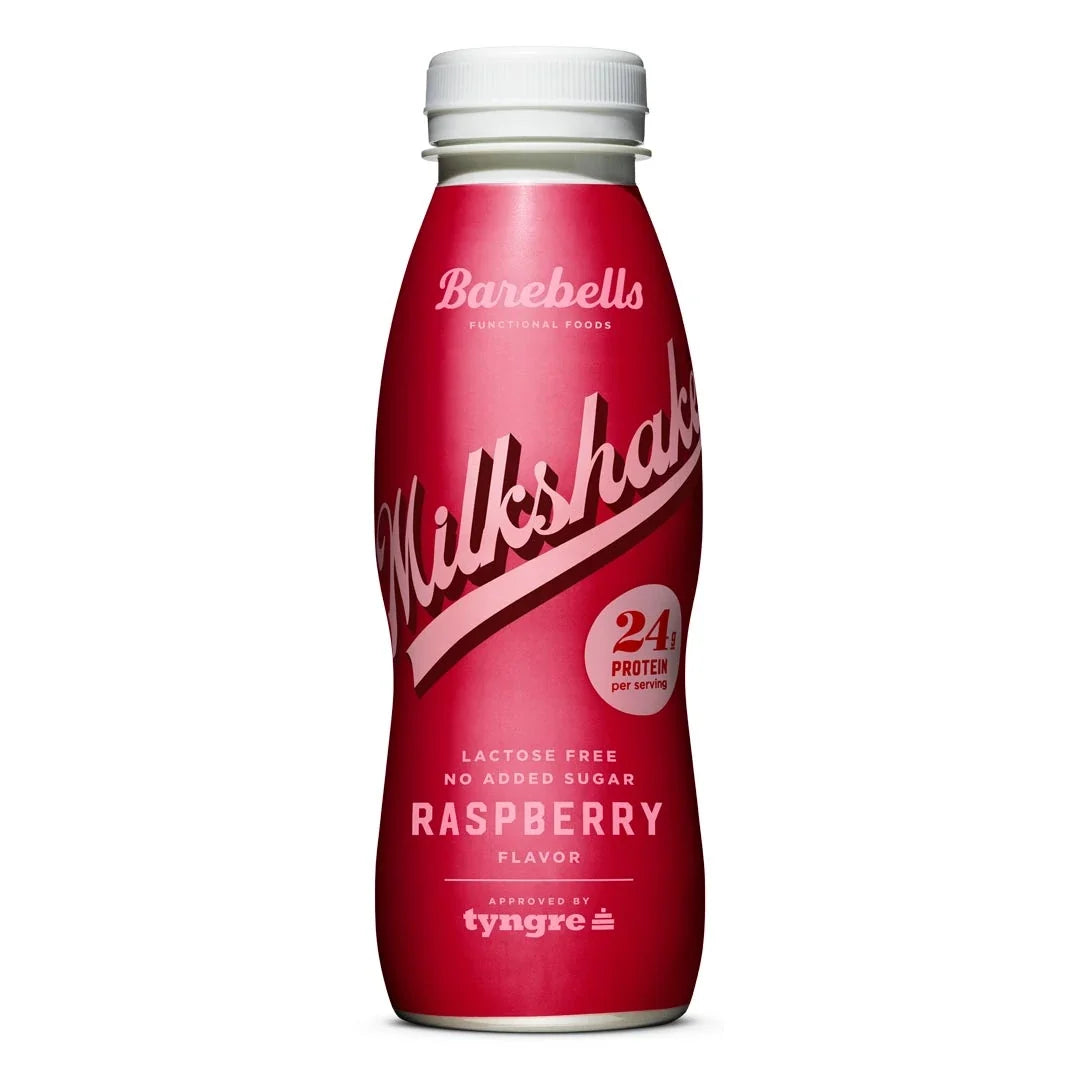 Barebells Milkshake 330 ml proteindryck i en mörkrosa flaska med vit kork för smaken Raspberry., bild 3 av 9