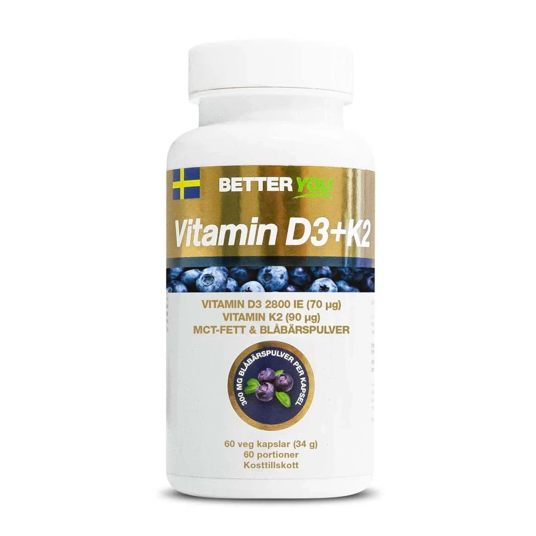 Better You Vitamin D3+K2 60 caps för immunsystemet, förpackad i en vit burk med blåbärsmotiv och gulddetaljer., bild 1 av 1