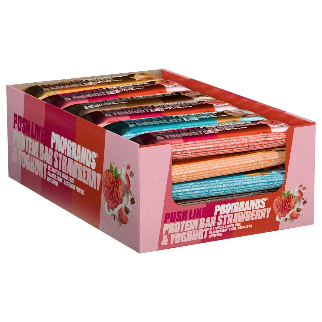24 x Pro Brands Proteinbar 45 g Mixpack i en rosa displaylåda fylld med proteinbars i olika smaker., bild 1 av 1