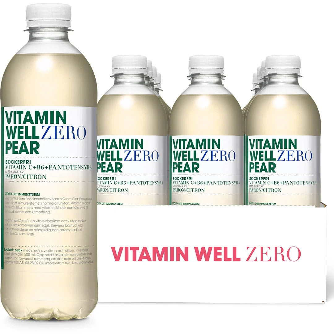12 x Vitamin Well Zero 500 ml Pear i en vit kartong med genomskinliga flaskor med vita etiketter, grön och blå text.