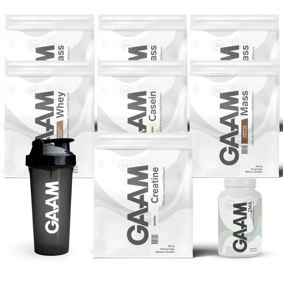 GAAM Complete Weight Gain Pack med kosttillskott i vita påsar, en burk och en svart shaker., bild 1 av 1