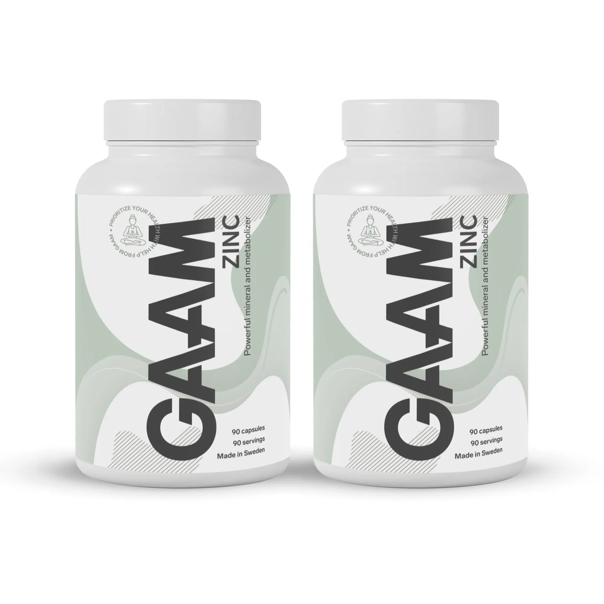 2 x GAAM Zinc 90 caps i två vita plastburkar med svart text och ljusgröna detaljer.